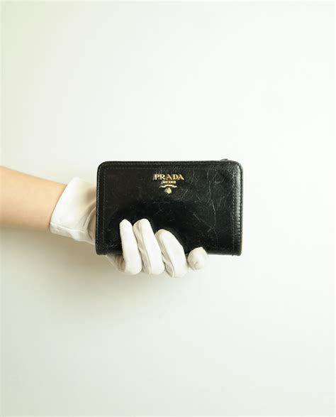 prada half zip wallet|prada outlet wallet.